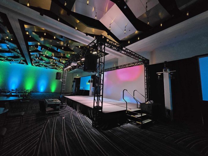Ballroom set for an awards gala with balloon decor