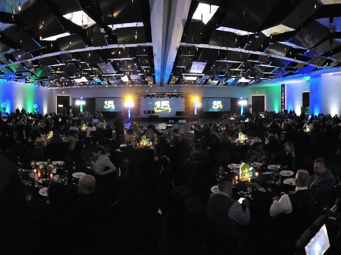 Wide view of a formal gala dinner ballroom