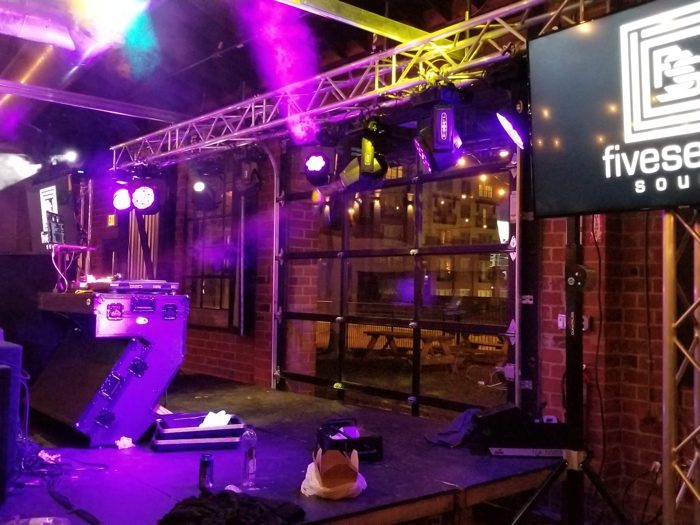 fiveseven sound DJ booth at a night patio show